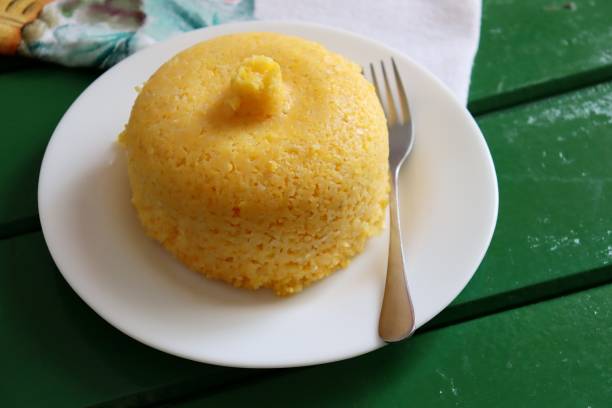 istock Brazilian Couscous (Cuscuz Brasileiro) on green background. Breakfast. 1304750288