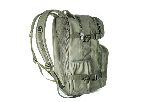 istock Backpack for hiking and hunting. Camouflage backpack suitable for the forest. Woodland camouflage military backpack. Military backpack isolated on white. 1304751508