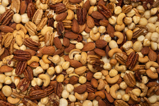 istock Mix of nuts as a background. 1304752966