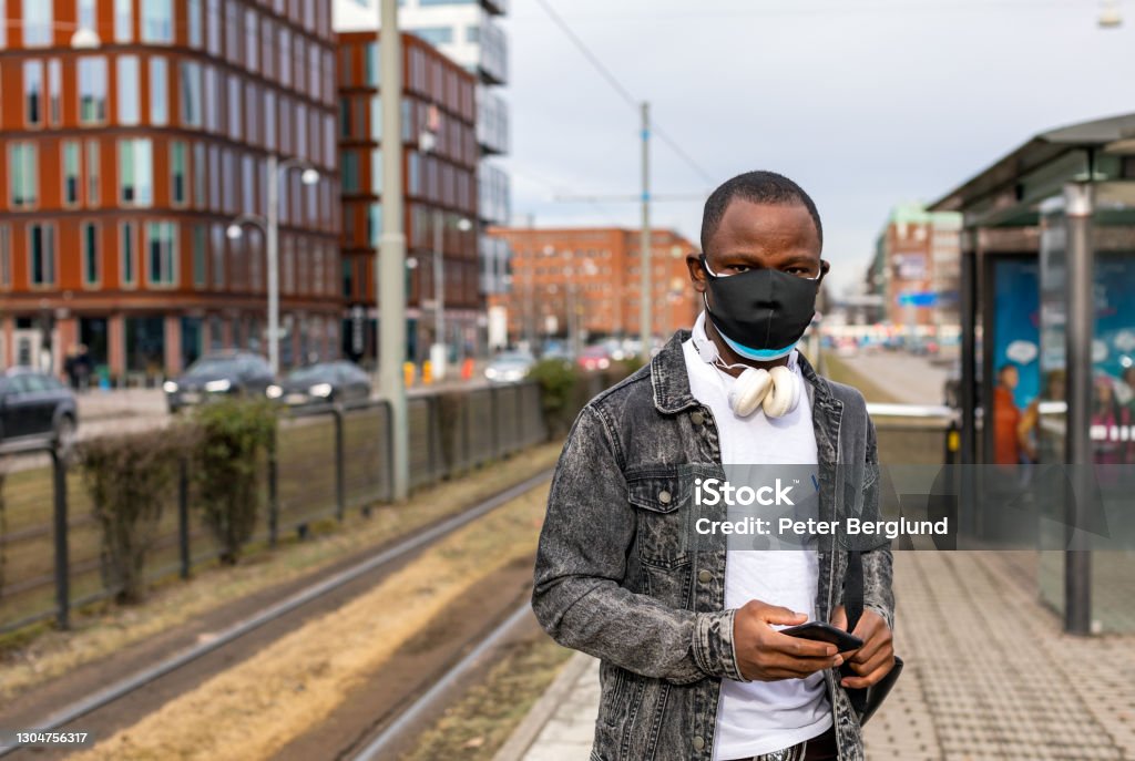 Man Wearing Two Face Masks Stock Photo - Download Image Now