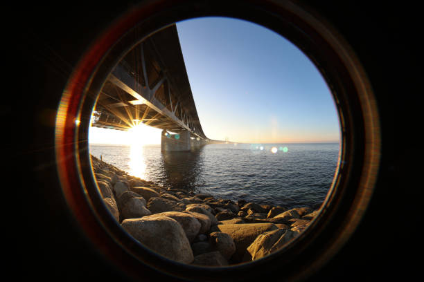 istock Inside lens view of Sun and Oresund bridge 1304757942