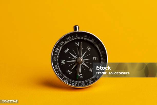 Compass Stock Photo - Download Image Now - Navigational Compass, Studio Shot, Arrow Symbol
