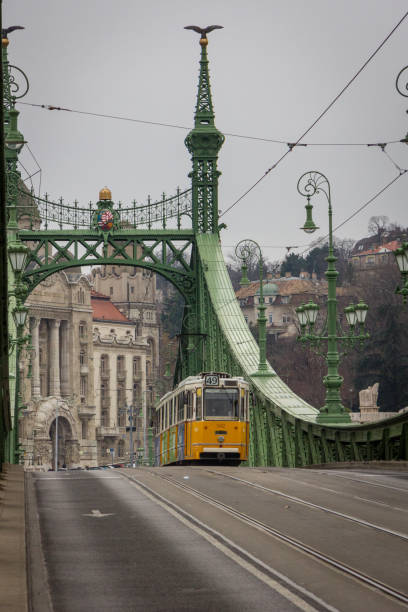 istock Trams running through the streets of budapest 1304760252