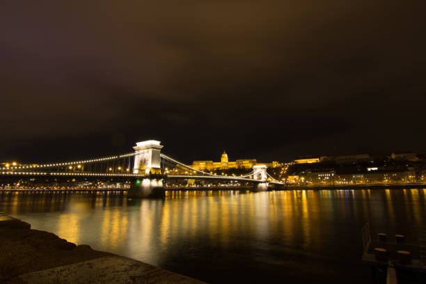 istock budapest parliament illuminated by night from pest 1304760279