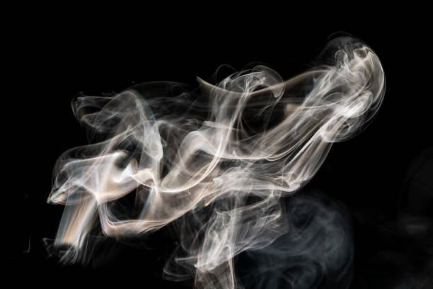 istock Grey smoke abstract texture and isolated effect with dark background 1304761615