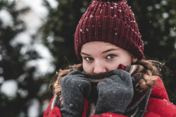 istock Young girl standing in the cold 1304762853
