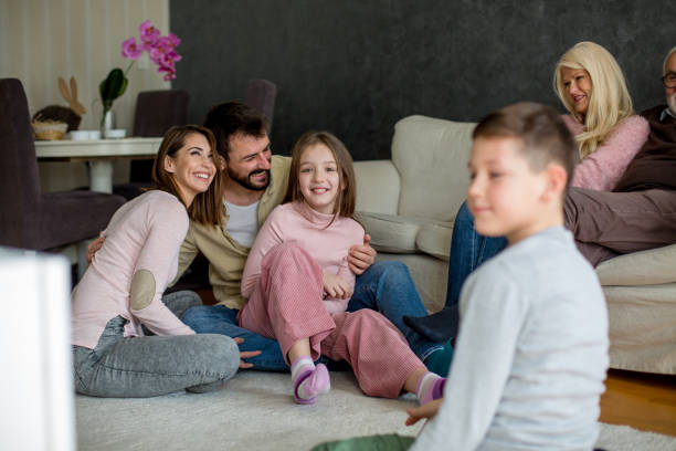 istock Big multi-generation family sharing free time together. 1304768365