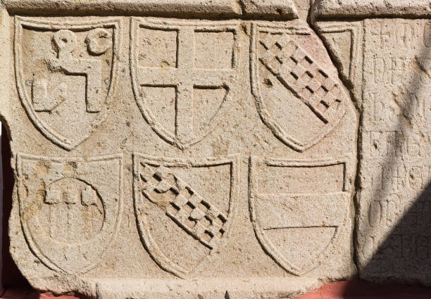 The Courtyard of the Feodosiya Museum of Antiquities. Genoese mortgage plate, 1396, limestone. Coats of arms of Kaffa, Genoa and nobles Russia, Crimea, Feodosia September 18, 2020-The Courtyard of the Feodosiya Museum of Antiquities. Genoese mortgage plate, 1396, limestone. Coats of arms of Kaffa, Genoa and nobles feodosiya stock pictures, royalty-free photos & images