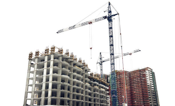 istock Construction site residential buildings with a cranes, isolated at white background 1304772643