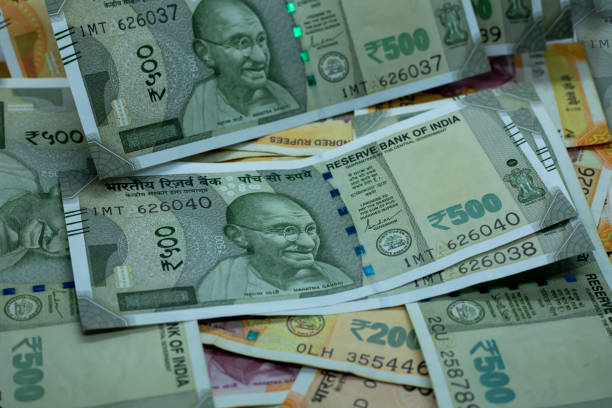 istock New Indian Currency Rupees Five Hundred and Two Hundred Note 1304776354