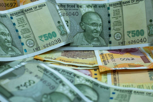 istock New Indian Currency Rupees Five Hundred and Two Hundred Note 1304776356