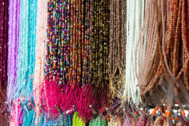 istock Many different fashionable beaded beads on the stand in store 1304776579