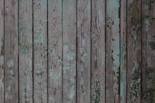 istock cracked old paint on wooden boards texture background planks backdrop 1304779621