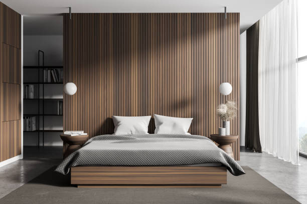 istock Wooden master bedroom interior with bookcase 1304781865
