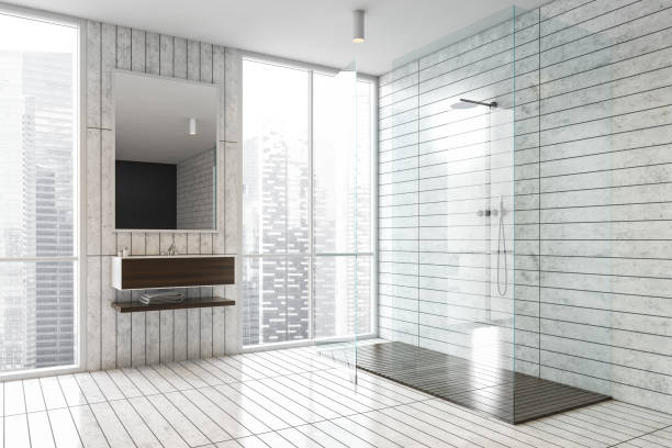 istock White tile bathroom corner with shower and sink 1304782016