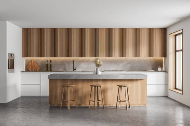 istock Bar counter in white and wooden kitchen 1304782045