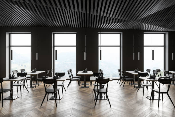 istock Modern gray restaurant interior with square tables 1304782495