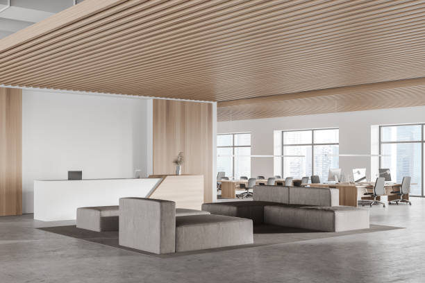 istock White and wooden office waiting room corner with open space area and sofas 1304782535
