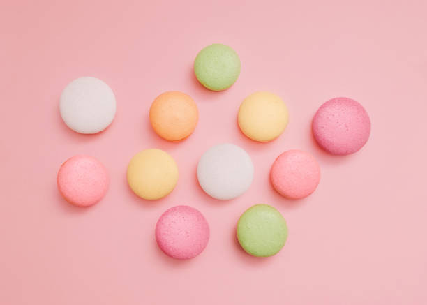 istock Macaroons Cute top view photo for posters and banners 1304783204