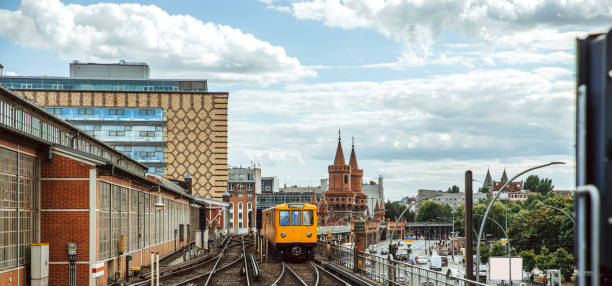 istock Yellow metro train in Berlin on Oberbaum bridge 1304784558