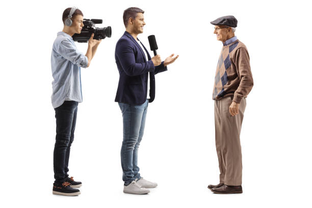 istock Videographer and a male reporter interviewing an elderly man 1304791422