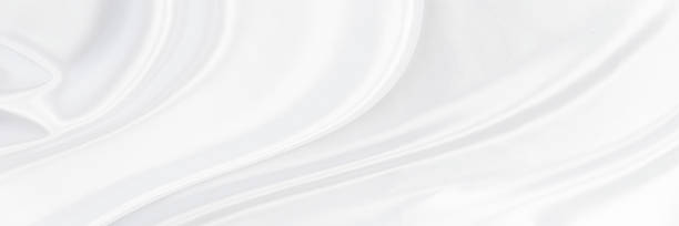 istock White gray satin texture that is white silver fabric silk panoramic background with beautiful soft blur pattern natural. 1304791447