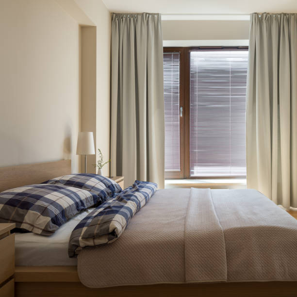 istock Sunny and simple bedroom 1304791827