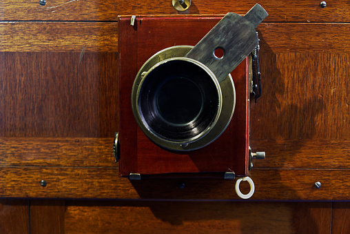 the photographic lens of a daguerreotype of the late 1800s