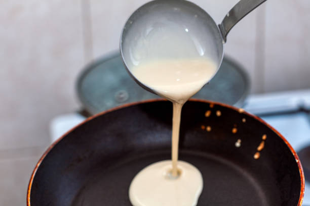 istock Preparation of pancake 1304799717