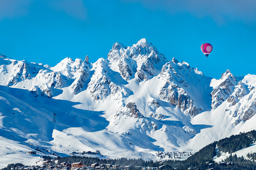 Courchevel valley in French Alps, hot air balloon