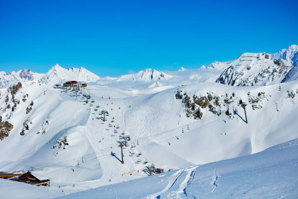 istock French alps and ski lift over snow mountain peaks 1304804036