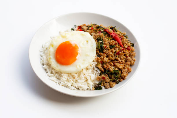 istock Rice topped with stir-fried pork with holy basil and fried egg 1304806218