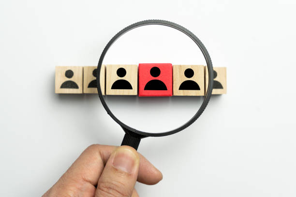 istock Searching for talent or employee conceptual using magnifying glass 1304813866