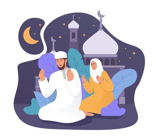 istock Muslim man and his wife praying together at night 1304814095