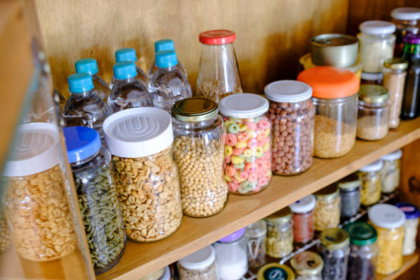 istock Full pantry with pots and grains 1304818253