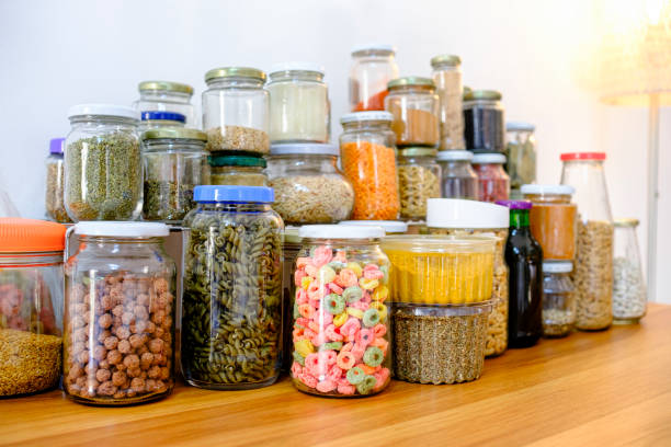 istock Table full of glass jars with bulk staples 1304818258