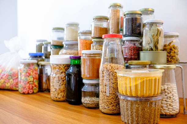 istock Complete pantry with several glass jars for food storage 1304818271