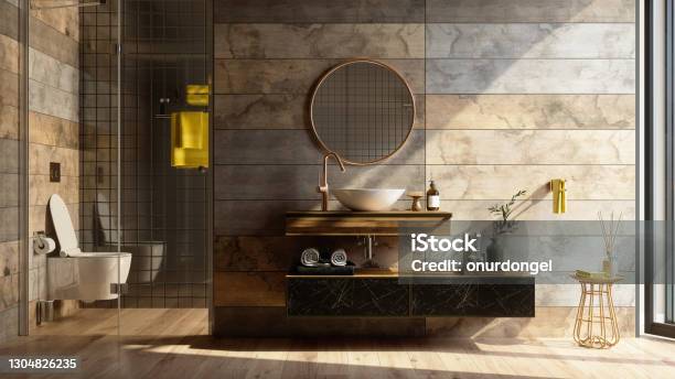 Luxury Bathroom Interior With Shower Toilet Mirror And Yellow Towels Stock Photo - Download Image Now