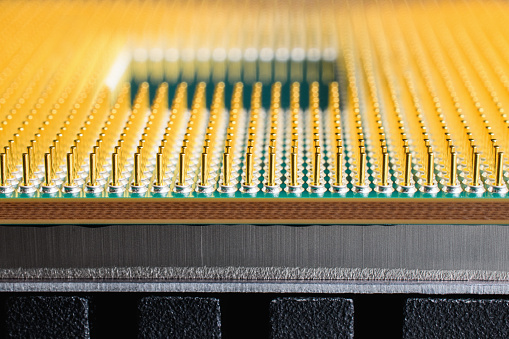 Blurred background. Computer processor macro, side view.  CPU close-up