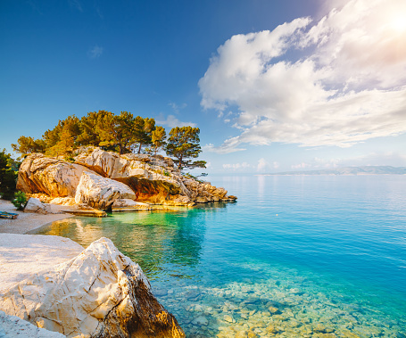 Cozy and wild beach with azure water in the luxurious lagoon. Location place Croatia, Dalmatia region, Balkans, Europe. Scenic image of popular european health resort. Discover the beauty of earth.
