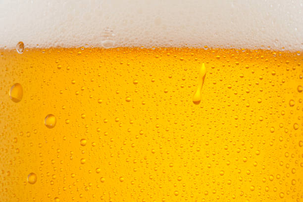 istock Beer Background. Ice Cold Beer Glass With Water Drops Condensation 1304844252
