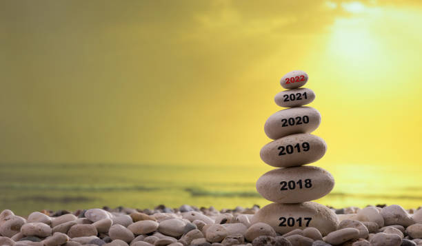 istock Years written on the stone tower. 1304847004
