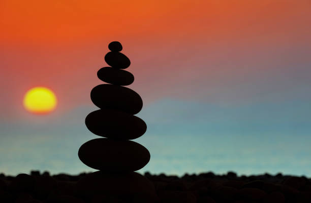 istock Silhouette stone tower on the beach. 1304847188