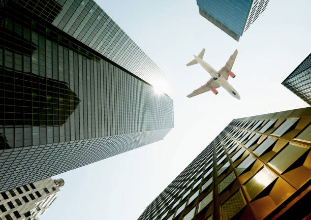 istock Airplane flying over skyscrapers, NYC. 1304848180