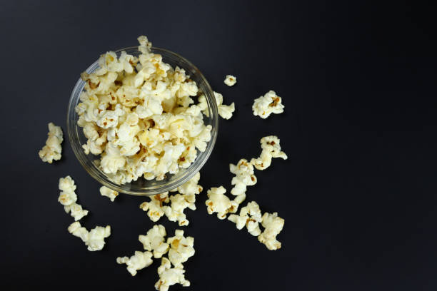 istock caramel popcorn in a bowl, top view 1304848453