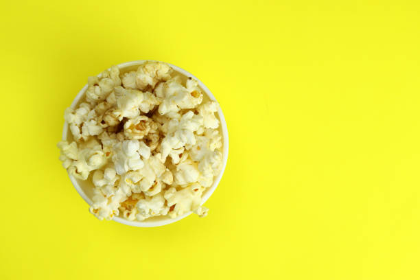 istock caramel popcorn in a ceramic bowl, top view 1304848546