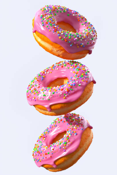 istock Set of flying glazed donuts with sprinkles on a white background 1304851170