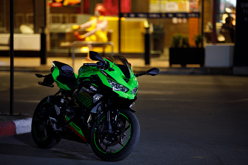 CHIANG MAI, THAILAND - FEB 27 2021 : Kawasaki Ninja ZX-25R The 249.8cc  inline 4-cylinder engine at a staggering 15,500 RPM and 22.9 Nm of torque at 14,500 RPM. The redline you ask It is at 17,000 RPM