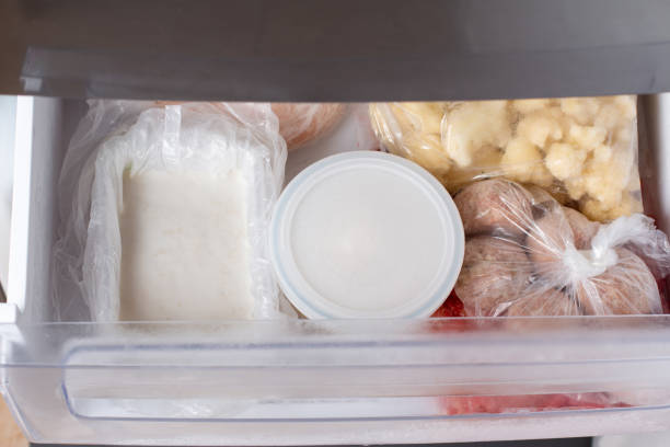 istock Frozen broth in a container in the freezer 1304854782
