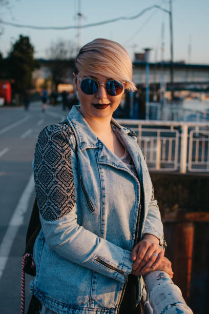 istock Pretty young woman in a sunset 1304854822